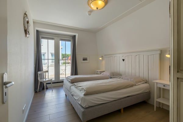 Slaapkamer - Luxe appartement dicht bij het strand in Koudekerke (4)