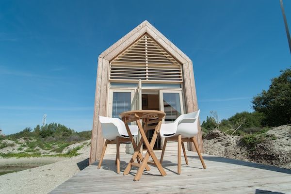 Terras - Retreat aan het meer met hangmat in Ouddorp (5)