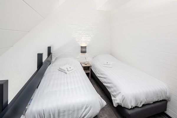 Slaapkamer - Stijlvol appartement aan zee in Bruinisse (5)