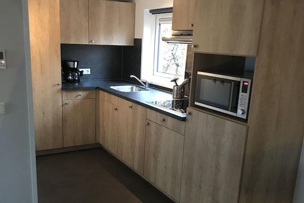 Keuken - Vreedzaam boschalet in Elst (3)