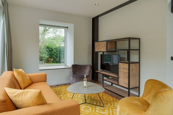Woonkamer - Bungalow op Texel bij duinenpark in De Koog Texel (3)