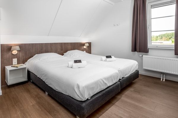 Slaapkamer - Villa in Nieuwvliet-Bad bij het Strand in Nieuwvliet-Bad (5)
