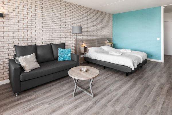 Woonkamer - Moderne kustontsnapping in Bruinisse (1)