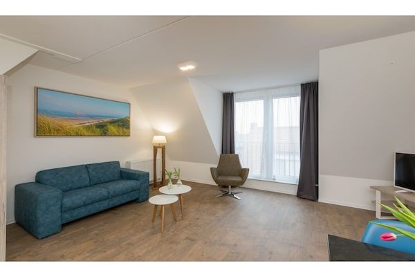 Woonkamer - Stijlvolle strandvakantie in Zoutelande (4)