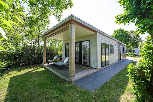 Buitenkant - Prachtige lodge aan de rivier met panoramisch uitzicht in Zuna (1)