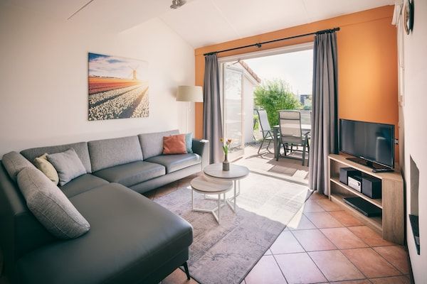 Woonkamer - Dunimar Gezellig Vakantiehuis in Noordwijkerhout (2)