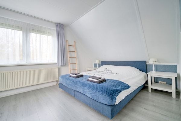 Slaapkamer - Vakantiehuis in Zeewolde bij Bos in Zeewolde (4)