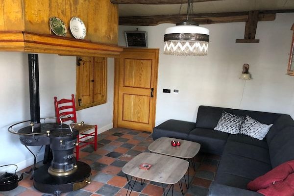 Woonkamer - Boerderij in Staphorst met sauna in Rouveen (2)