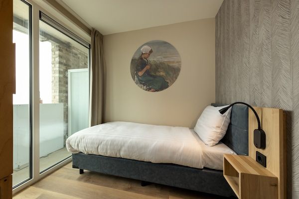 Slaapkamer - Licht appartement vlakbij zee in Egmond aan zee (4)