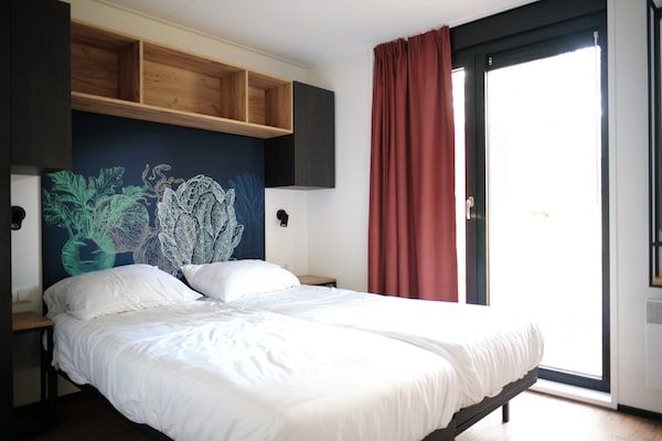 Slaapkamer - Prachtige lodge in Gulpen met geweldig uitzicht in Gulpen (4)