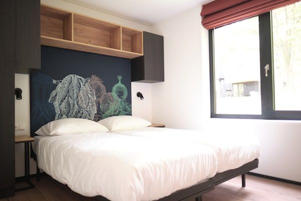 Slaapkamer - Vrijstaande lodge in Gulpen met speeltuin in Gulpen (3)