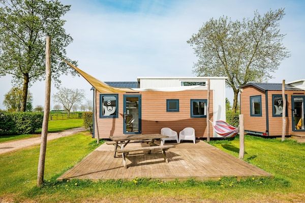 Buitenkant - Tiny Beach House bij het strand in Maurik (1)
