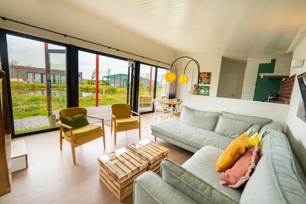 Woonkamer - Chique verblijf vlakbij de Noordzee in Callantsoog (3)