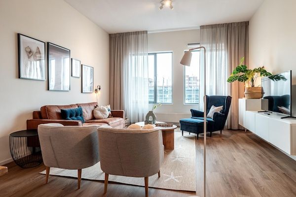 Woonkamer - Schitterend appartement met uitzicht op de haven. in Den Haag (1)