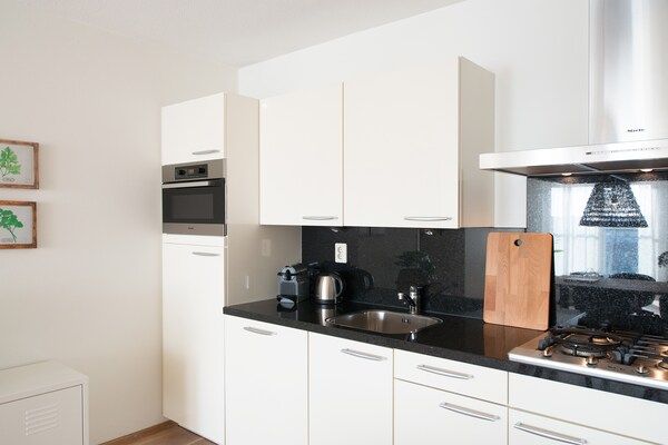 Keuken - Modern appartement met geweldig uitzicht in Den Haag (4)