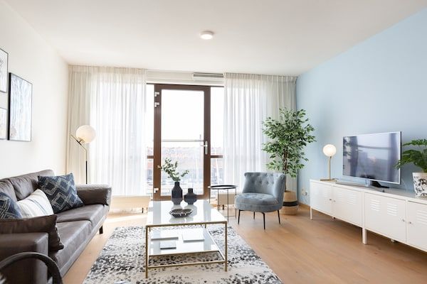 Woonkamer - Gerestyled appartement met geweldig uitzicht in Den Haag (5)