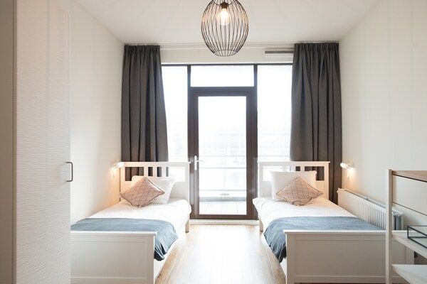 Slaapkamer - Aantrekkelijk appartement in Den Haag met balkon in Den Haag (4)