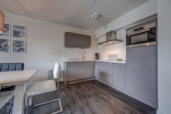 Keuken - Ontspannende villa bij de duinen in Kamperland (4)