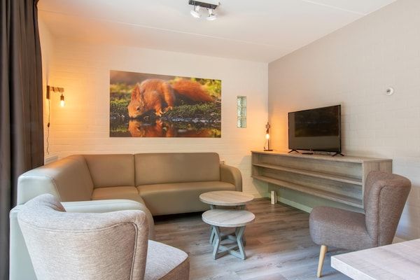 Woonkamer - Gezellige bosvakantie in Oosterhout (2)