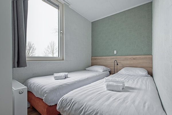 Slaapkamer - Gezellige Bungalow Sauna Valkenburg in Walem (3)