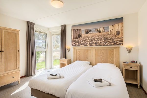 Slaapkamer - Gezellig kustverblijf Texel in De Koog (4)