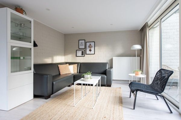 Woonkamer - Bungalow bij Veluwezand in Kootwijk (5)