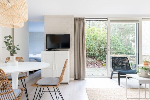 Woonkamer - Bungalow bij Veluwezand in Kootwijk (2)