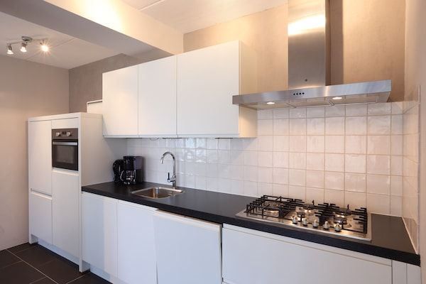 Keuken - Comfortabele bungalow voor een groep in Vlagtwedde (4)