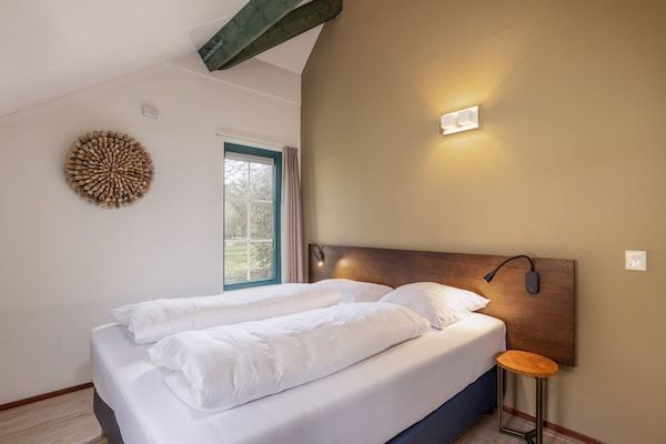 Slaapkamer - Bungalow in Veluwe nabij Harderwijk in Putten (5)