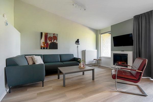 Woonkamer - Bungalow met sauna nabij Valkenburg in Walem (3)