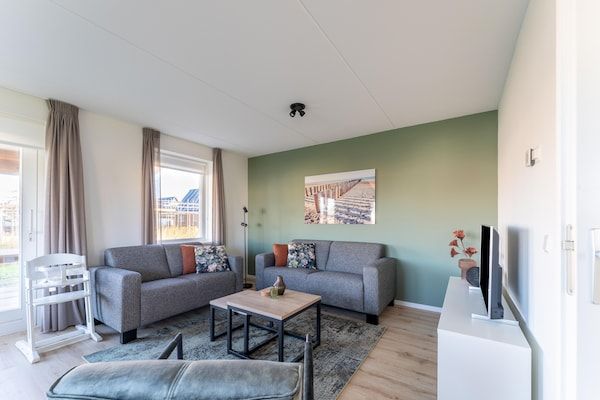 Woonkamer - Ontspannende natuurretraite met strand in Scherpenisse (2)