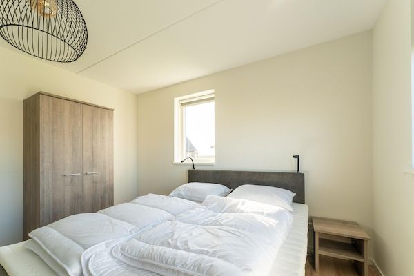 Slaapkamer - Ontspannende natuurretraite met strand in Scherpenisse (5)