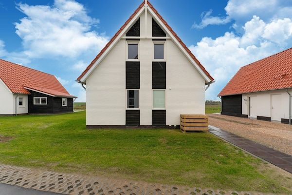 Buitenkant - Modern vakantiehuis aan zee met sauna in Scherpenisse (1)
