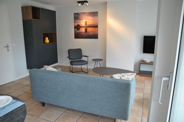 Woonkamer - Eilandvakantie met bubbelbad in De Koog Texel (4)