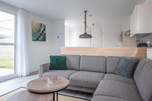 Woonkamer - Lodge in Nieuwvliet-Bad bij het Strand in Nieuwvliet-Bad (3)