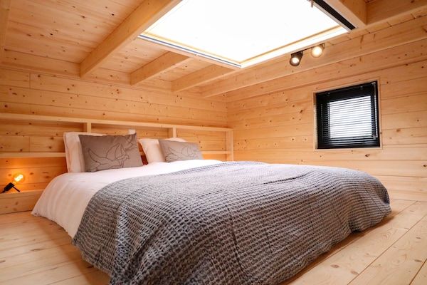 Slaapkamer - Leuk tiny house met pelletkachel, nabij de Ijssel in Olburgen (3)