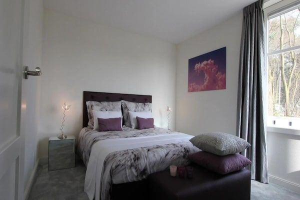 Slaapkamer - Villa aan het water met dakterras voor 6 personen in Otterlo (4)