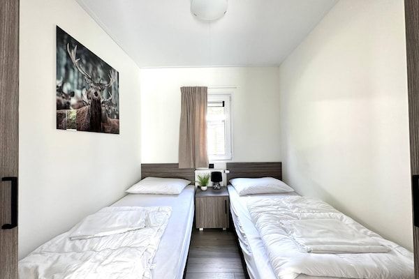 Slaapkamer - Natuurparkchalet in Hoenderloo in Hoenderloo (4)