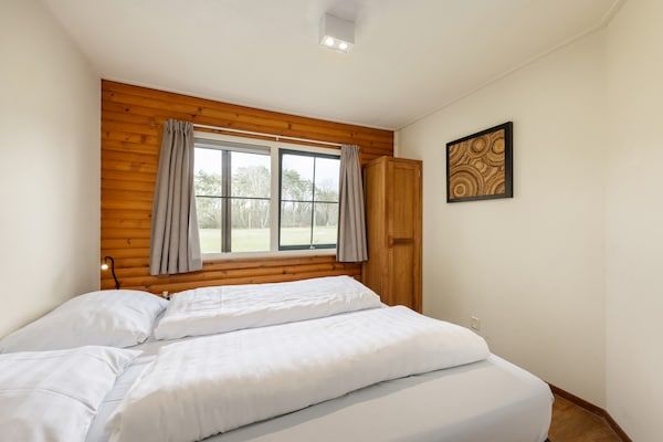Slaapkamer - Bungalow in Veluwe bij Harderwijk in Putten (4)