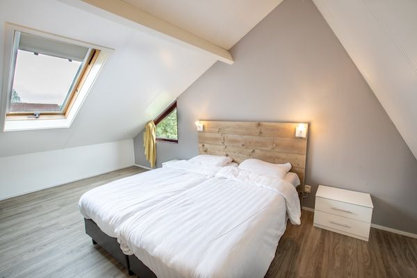 Slaapkamer - Huisdiervriendelijke vakantie in Heinkenszand (3)