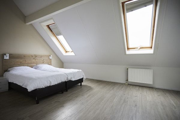 Slaapkamer - Vakantiehuis met tuin in Zeeland in Heinkenszand (5)