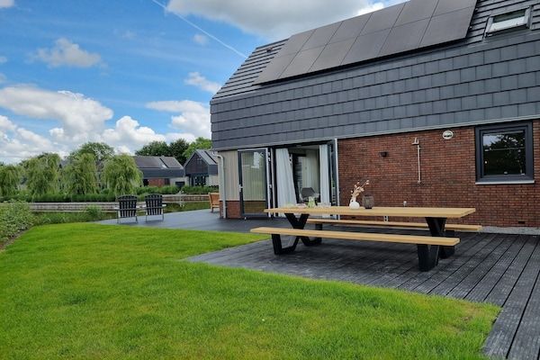 Terras - Villa aan het water met aanlegsteiger in Balk (2)