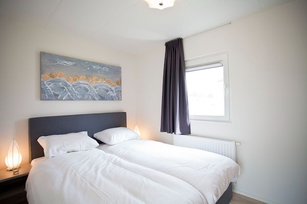 Slaapkamer - Gezellig chalet bij strand op 600 m in Breskens (4)
