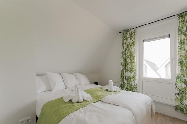 Slaapkamer - Vakantiehuis in Stavoren met eigen aanlegsteiger in Stavoren (4)