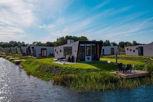 Buitenkant - Modern chalet in Kampen in vakantiepark in Kampen (1)