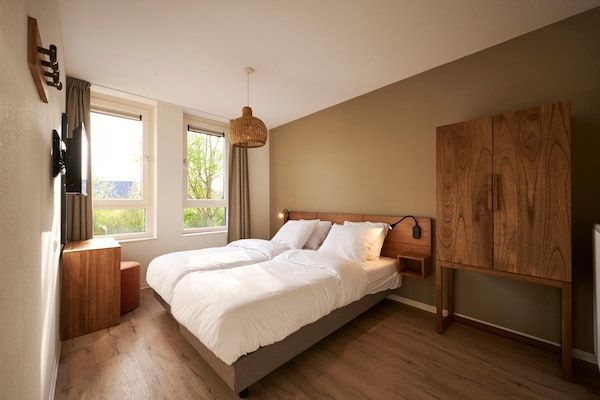 Slaapkamer - Ruim appartement bij wellness in Maastricht (1)