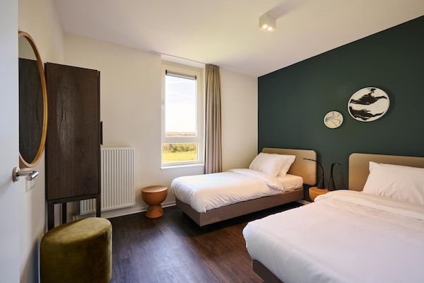 Slaapkamer - Ruim penthouse nabij wellness in Maastricht (1)