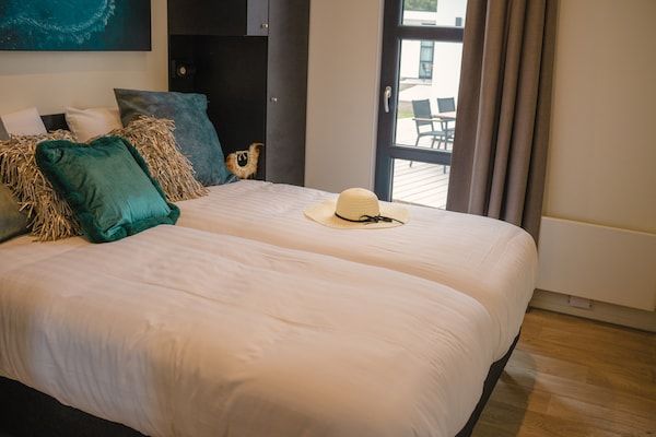 Slaapkamer - Huis in Arnhem met uitzicht op de Rijn in Maurik (4)