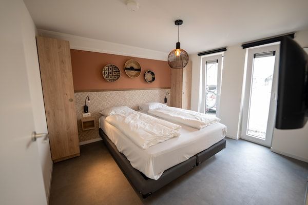 Slaapkamer - Villa in Breskens dicht bij het strand in Breskens (3)