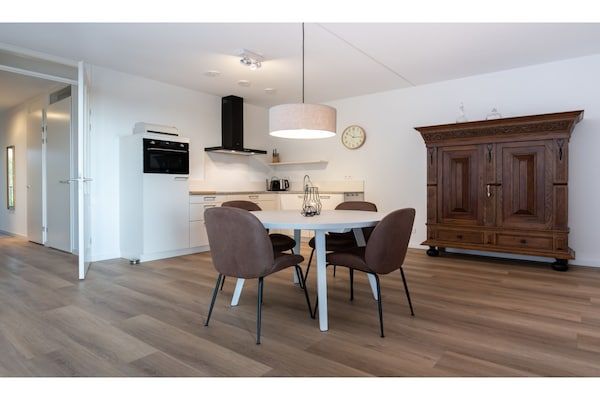 Eetkamer - Adembenemend penthouse-uitzicht in Kamperland (2)